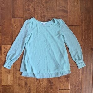 Blouse with beaded cuffs